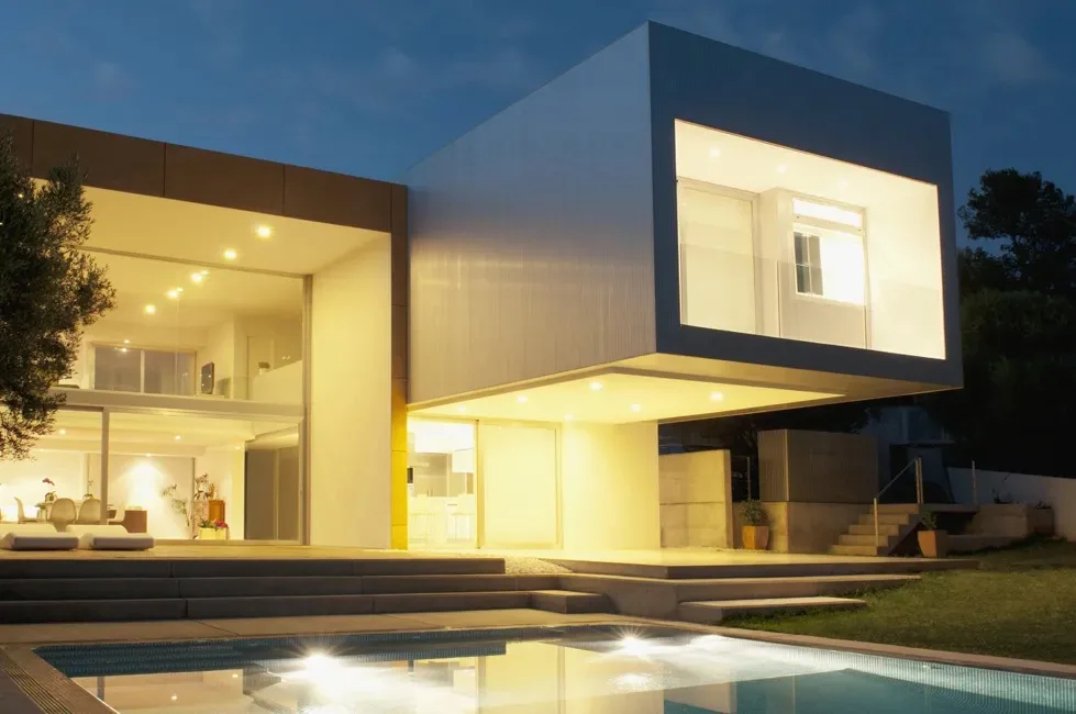 Architectural lighting across a modern home at dusk