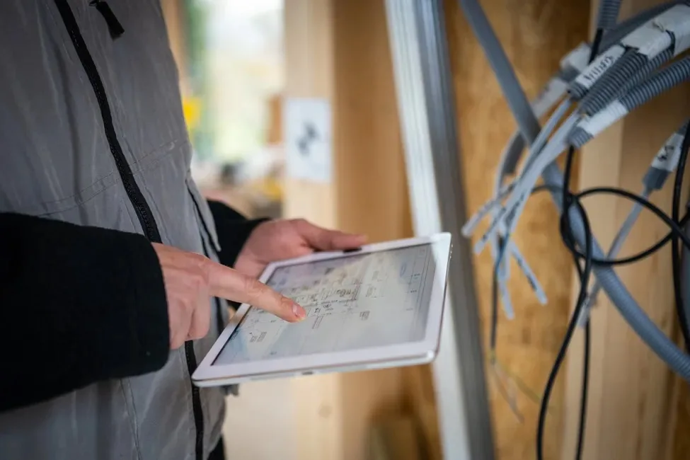 Checking the wiring plan before work starts
